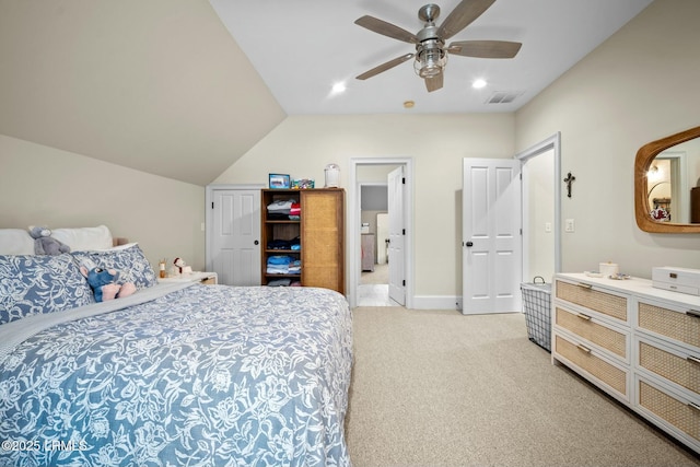 carpeted bedroom featuring vaulted ceiling and ceiling fan