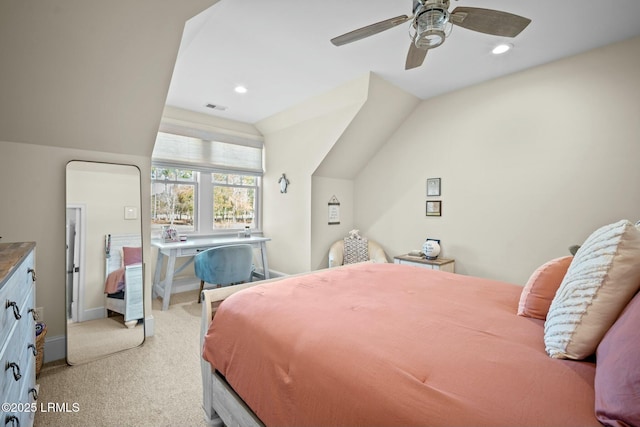 carpeted bedroom with ceiling fan and lofted ceiling