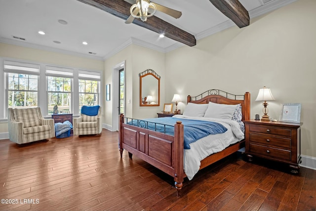 bedroom featuring ceiling fan, dark wood-type flooring, crown molding, and beam ceiling