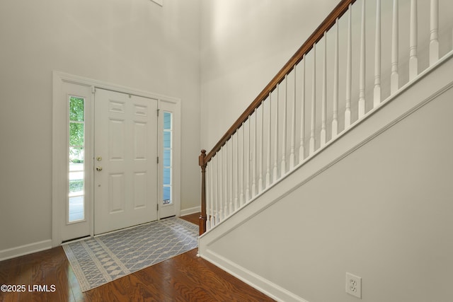 5 Junction Way, Bluffton, SC 29910 - foyer featuring wood finished floors, baseboards, a high ceiling, and stairs