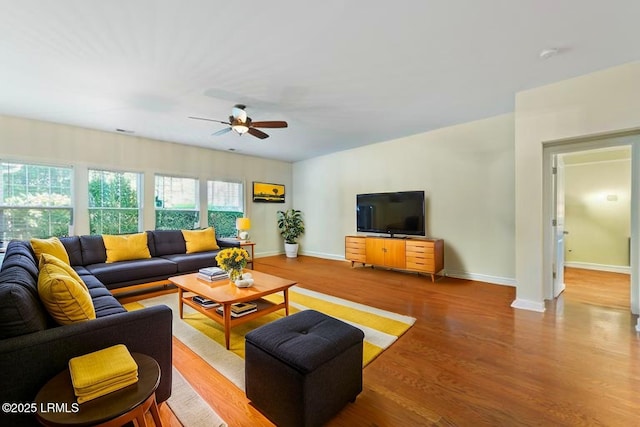5 Junction Way, Bluffton, SC 29910 - living room featuring ceiling fan, wood finished floors, and baseboards
