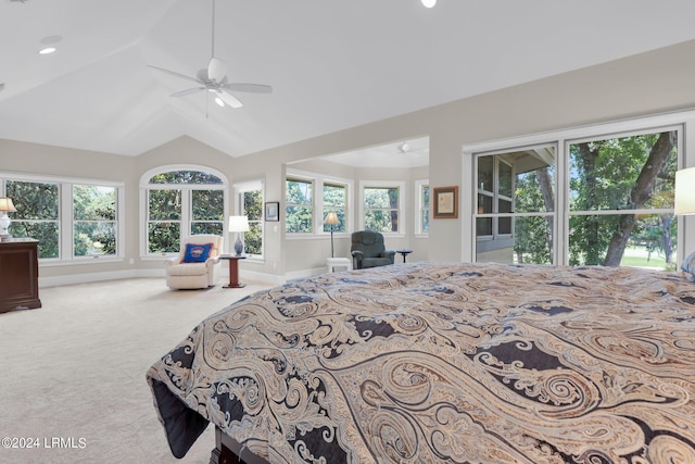 bedroom featuring vaulted ceiling, ceiling fan, and carpet