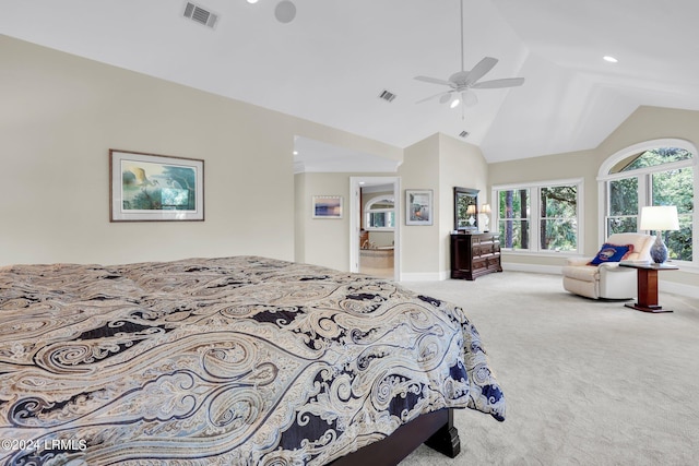 bedroom with lofted ceiling, connected bathroom, ceiling fan, and carpet flooring