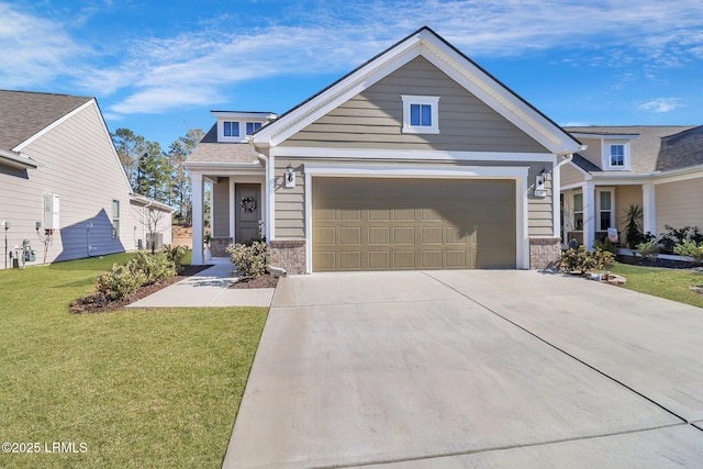 view of front of house featuring a garage and a front yard