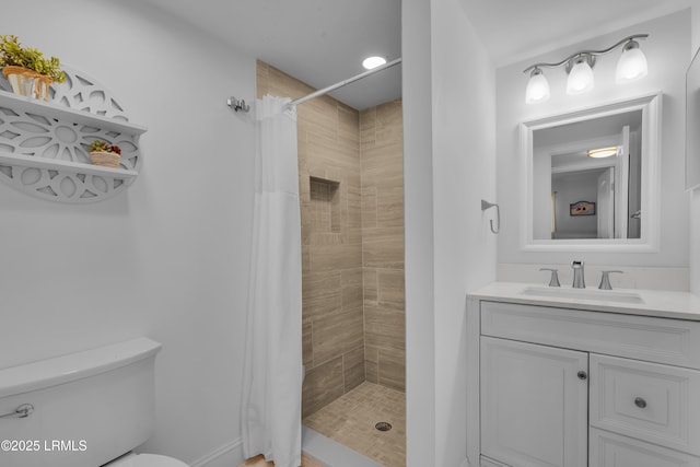 663 William Hilton Pkwy # 2309, Hilton Head Island, SC 29928 - bathroom with a tile shower, toilet, and vanity