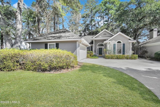 single story home featuring driveway and a front lawn