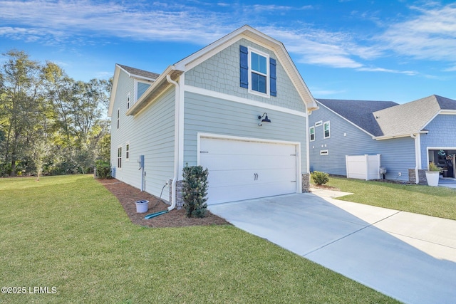 view of property exterior with a garage and a yard