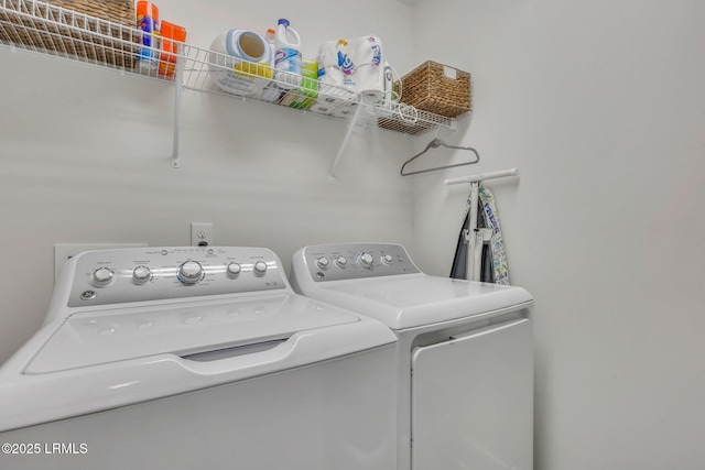 laundry room with washer and clothes dryer