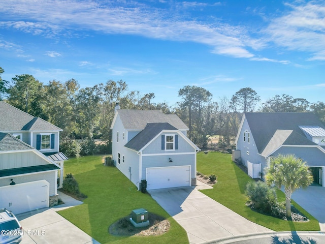 view of property exterior featuring a garage and a lawn