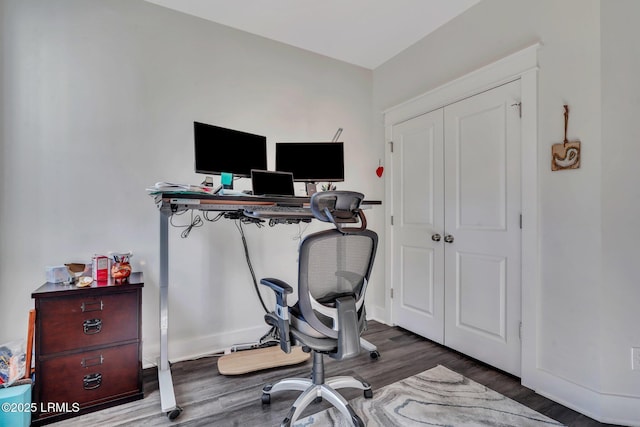 office space featuring dark wood-type flooring