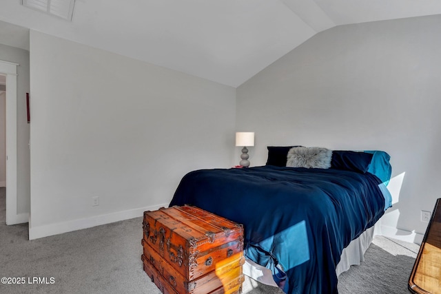 carpeted bedroom featuring vaulted ceiling