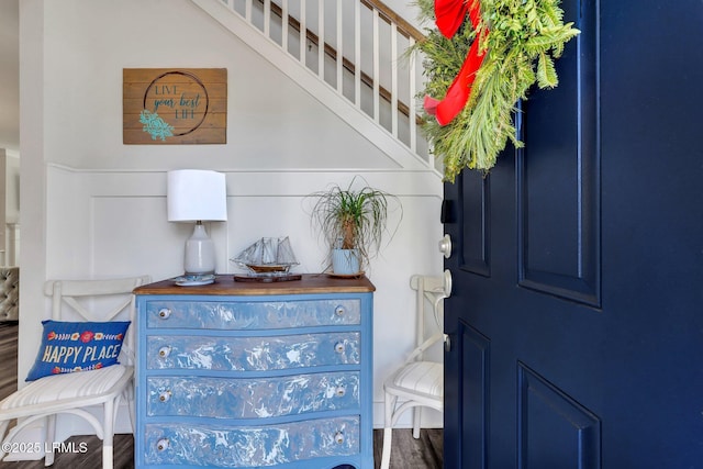 foyer entrance with wood-type flooring