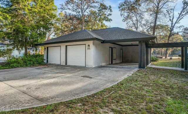 garage with a carport