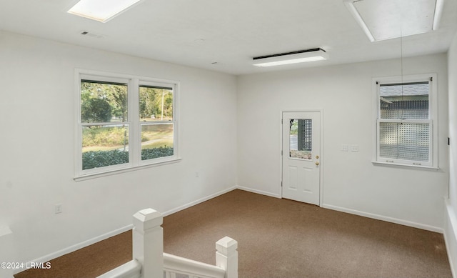 spare room featuring carpet flooring