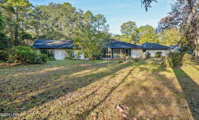 exterior space featuring a front lawn