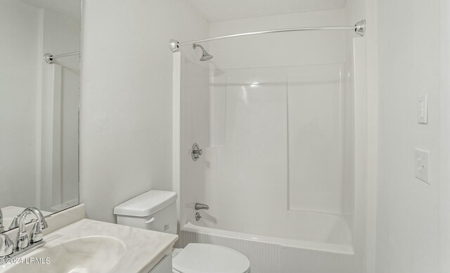 full bathroom featuring vanity, toilet, and bathing tub / shower combination