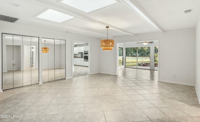 empty room featuring light tile patterned floors, beam ceiling, a skylight, and ceiling fan