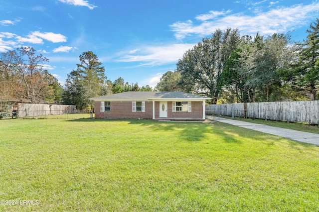 view of front of property with a front lawn