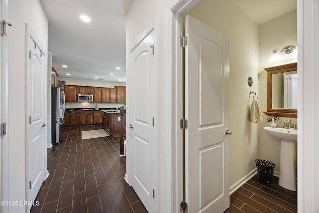 36 Independence Pl, Bluffton, SC 29910 - hallway featuring wood tiled floors and recessed lighting