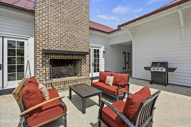 36 Independence Pl, Bluffton, SC 29910 - view of patio / terrace with an outdoor living space with a fireplace and area for grilling