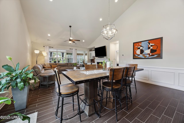 36 Independence Pl, Bluffton, SC 29910 - dining space with wood finish floors, ceiling fan, a wainscoted wall, high vaulted ceiling, and recessed lighting