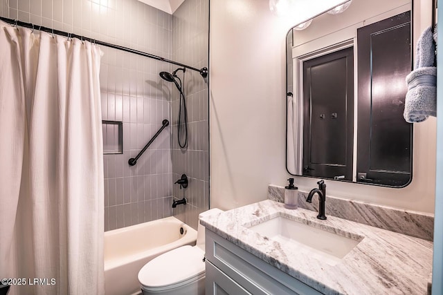 full bathroom featuring vanity, toilet, and shower / bath combo