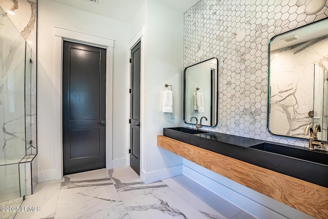 bathroom with vanity and a shower