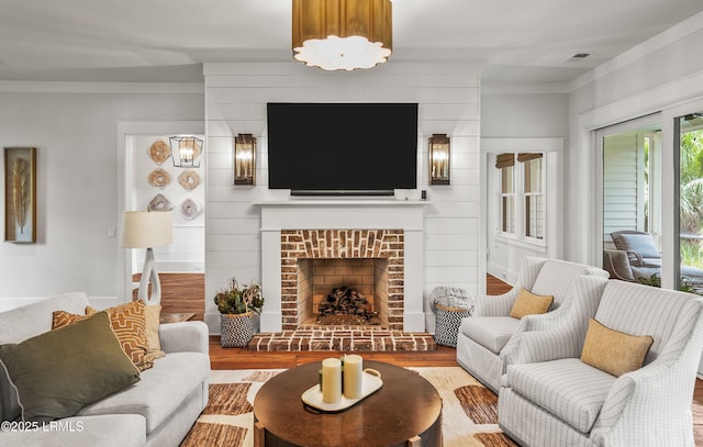 575 Distant Island Dr, Beaufort, SC 29907 - living area with wood finished floors and a brick fireplace