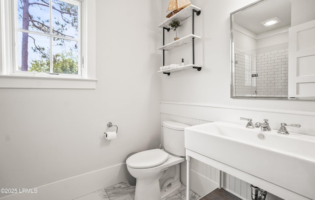575 Distant Island Dr, Beaufort, SC 29907 - bathroom with marble look tiles, plenty of natural light, vanity, and a shower