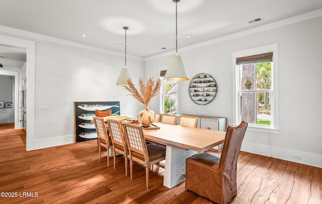 575 Distant Island Dr, Beaufort, SC 29907 - dining space featuring hardwood / wood-style flooring, ornamental molding, and recessed lighting