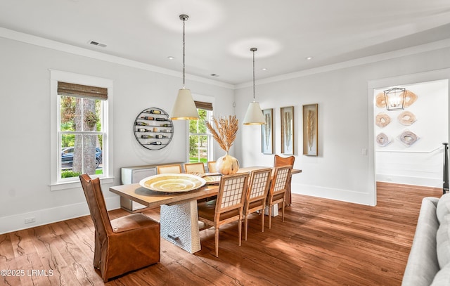 575 Distant Island Dr, Beaufort, SC 29907 - dining space featuring wood finished floors and crown molding