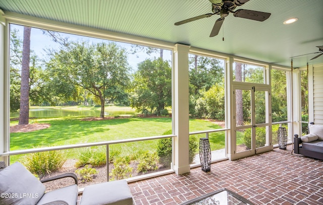 575 Distant Island Dr, Beaufort, SC 29907 - sunroom featuring a ceiling fan, a water view, and view of wooded area