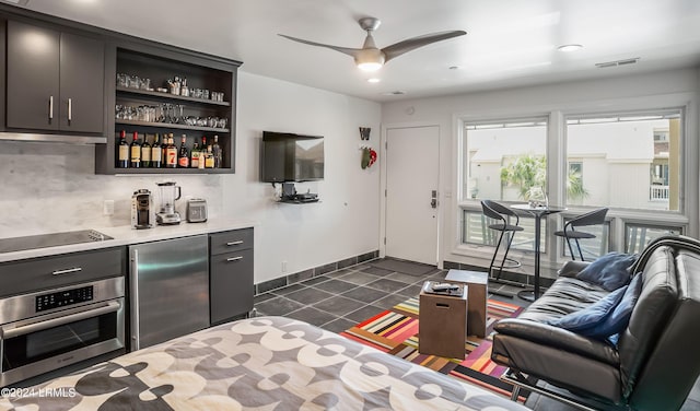 524 Sunsuite, Fripp Island, SC 29920 - interior space with ceiling fan and bar
