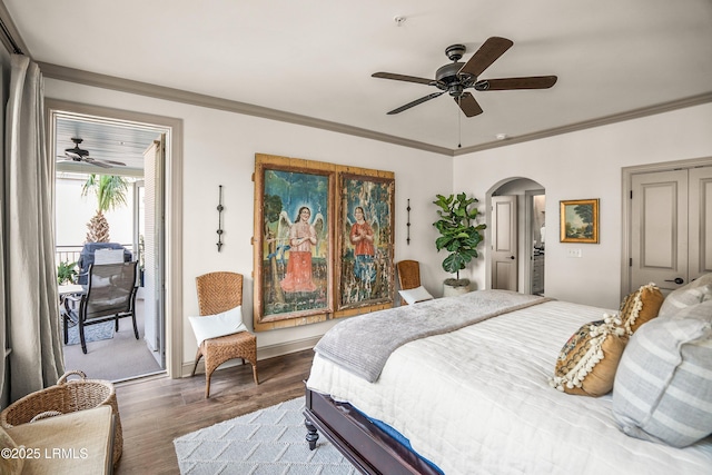 15 Sunset Blvd Unit 1201, Beaufort, SC 29907 - bedroom featuring arched walkways, access to exterior, wood finished floors, crown molding, and a ceiling fan