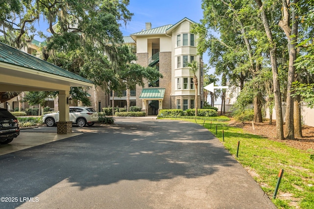 15 Sunset Blvd Unit 1201, Beaufort, SC 29907 - view of building exterior featuring covered and uncovered parking