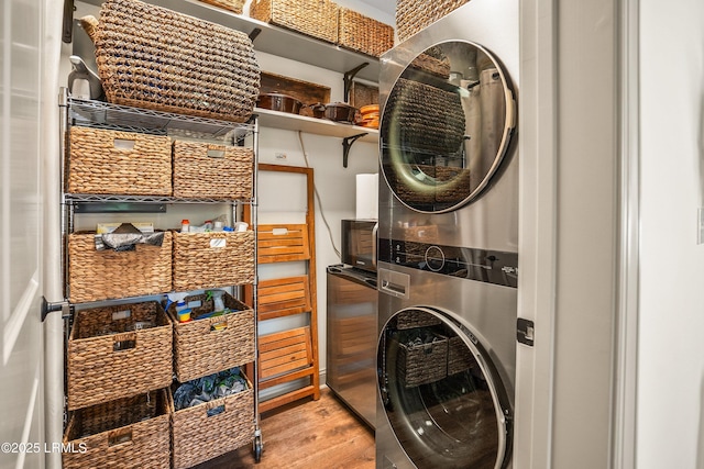 15 Sunset Blvd Unit 1201, Beaufort, SC 29907 - washroom with stacked washer / dryer and wood finished floors