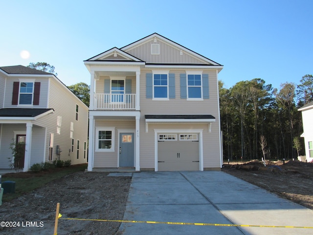 view of front of house with a balcony and a garage