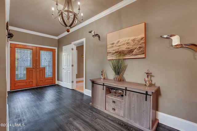 foyer featuring an inviting chandelier, dark hardwood / wood-style flooring, and ornamental molding