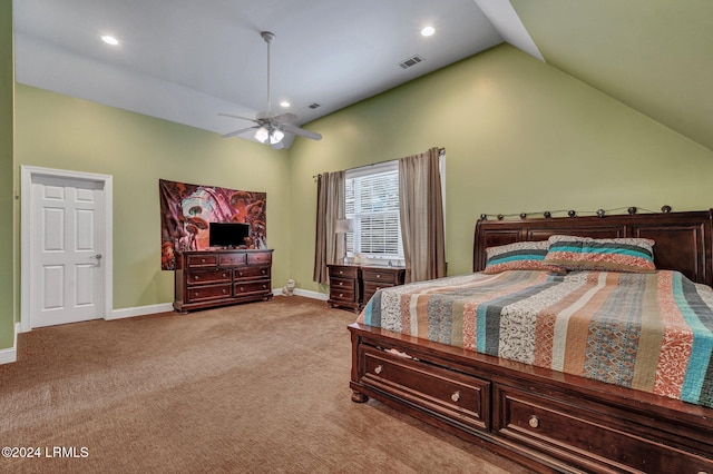 bedroom with vaulted ceiling, ceiling fan, and light colored carpet