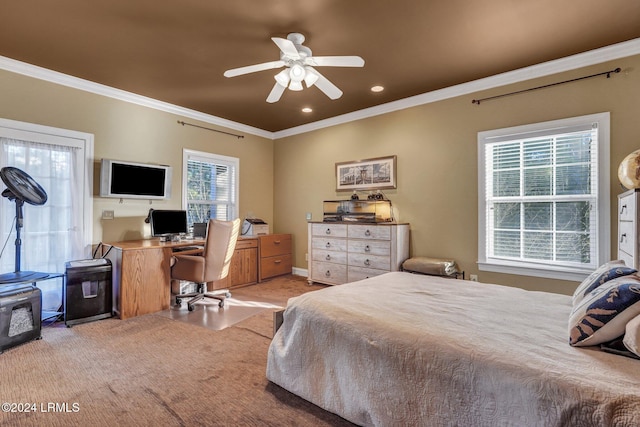 bedroom with multiple windows, ornamental molding, and ceiling fan