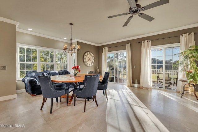 dining area with crown molding and ceiling fan with notable chandelier