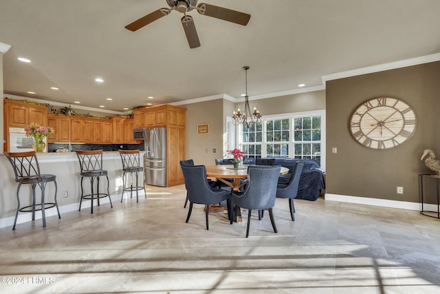 dining area featuring a notable chandelier and ornamental molding