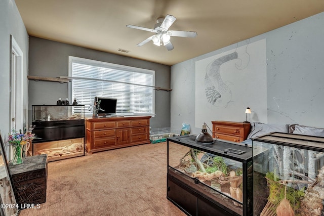 bedroom featuring ceiling fan and carpet flooring