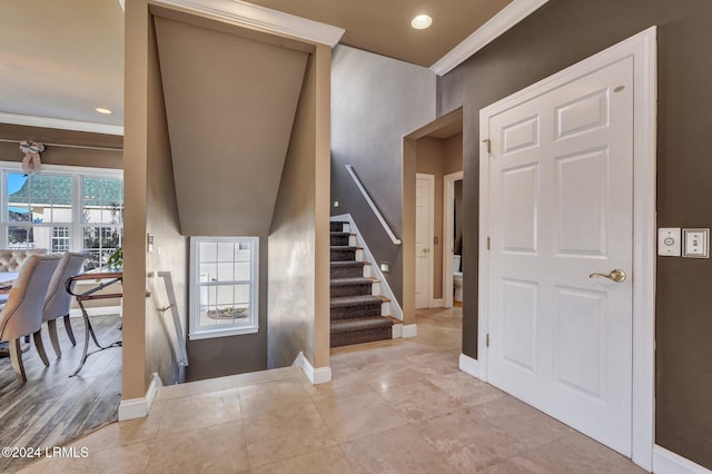 entrance foyer with ornamental molding