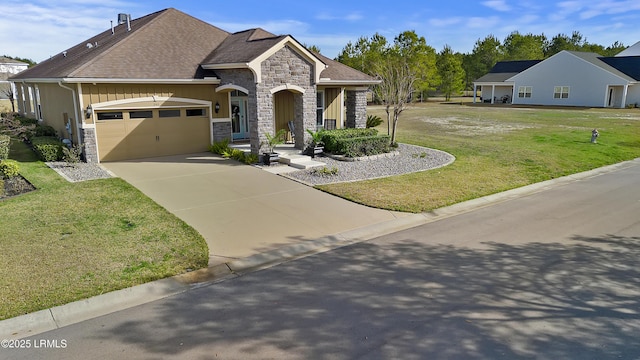 view of front of home featuring a garage and a front lawn