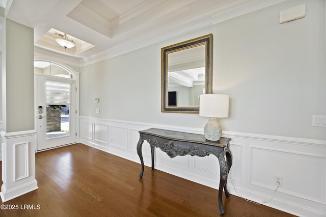 hall featuring coffered ceiling, ornamental molding, dark hardwood / wood-style floors, and beam ceiling