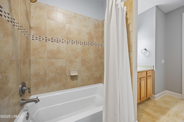 bathroom featuring shower / bath combination with curtain, tile patterned floors, and vanity