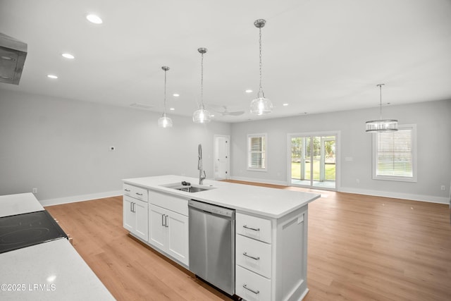 12 Meagan Dr, Beaufort, SC 29907 - kitchen featuring stainless steel dishwasher, a sink, recessed lighting, white cabinets, and light wood-type flooring