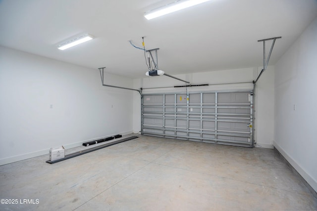 12 Meagan Dr, Beaufort, SC 29907 - garage featuring a garage door opener and baseboards