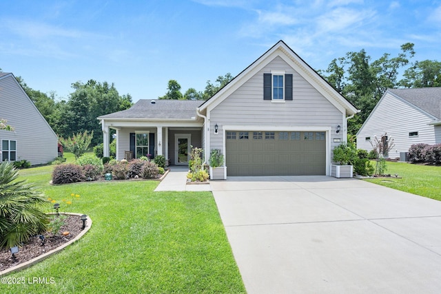 21 Heathrow Ave, Bluffton, SC 29910 - view of front of home featuring concrete driveway, a front lawn, and an attached garage
